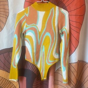 NASTY GAL Swirl Patterned knit sweater Bodysuit